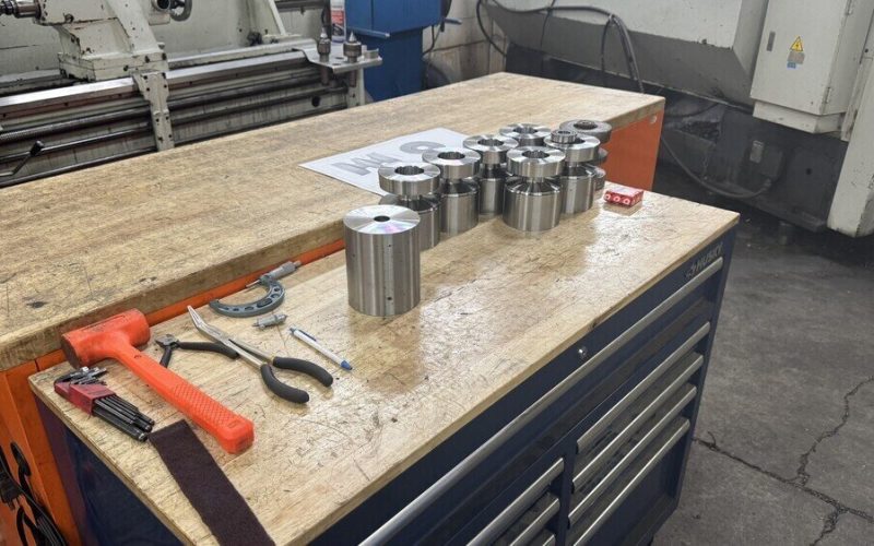 4-Axis CNC Lathe - Skid steer track rollers 1